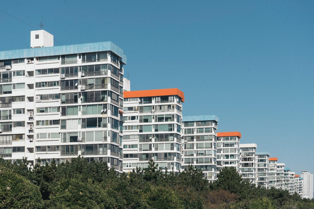 Reference photo of a row of apartment buildings